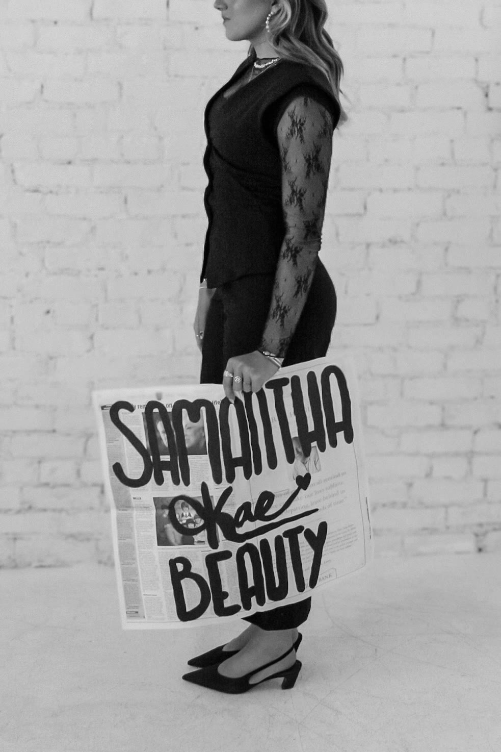 Samantha Kae Beauty brand shoot — hand-painted newspaper